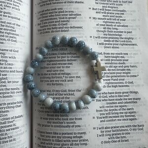 Elegant Beaded Bracelet with Cross Charm